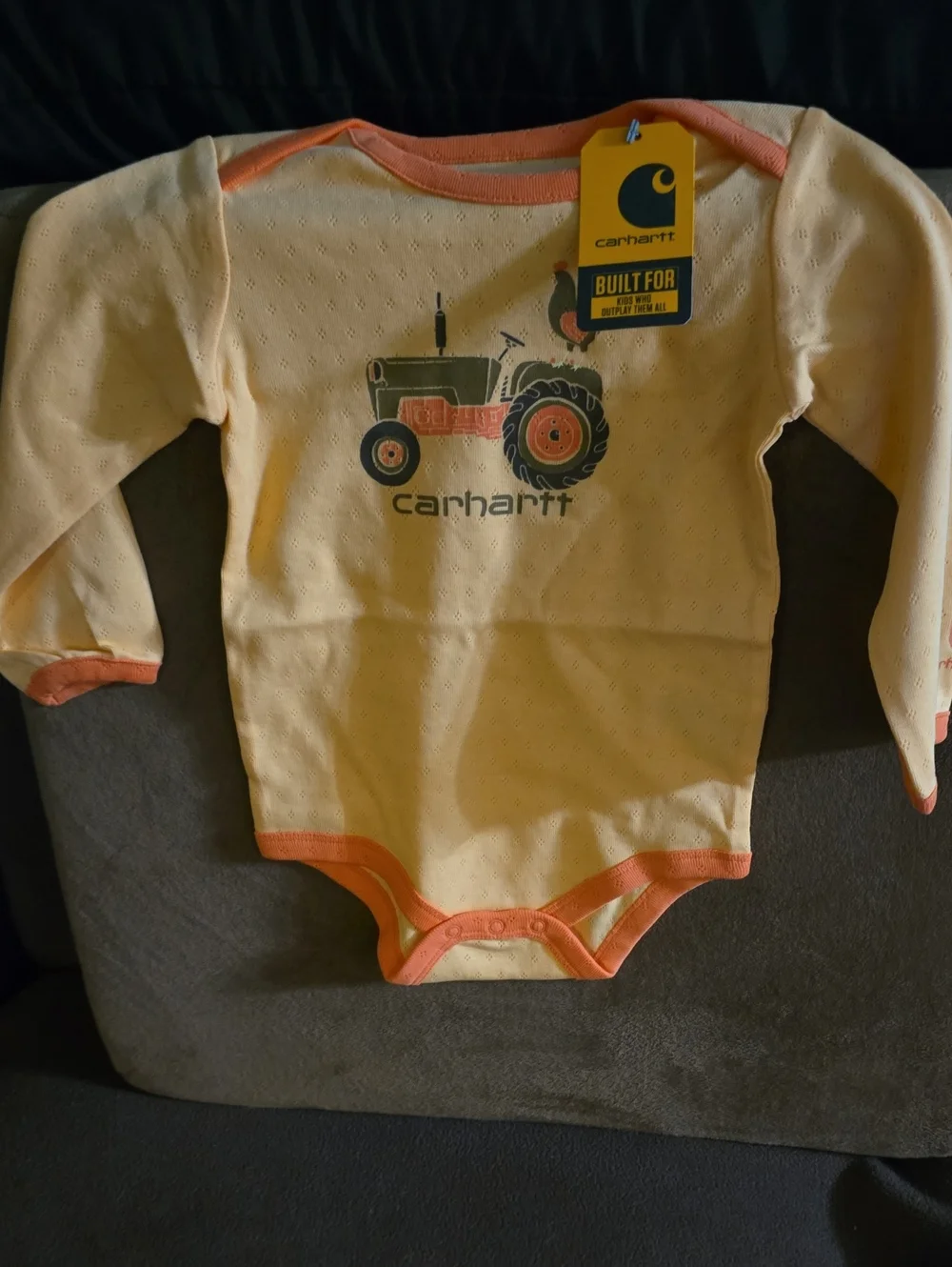 Carhartt Yellow Baby Long Sleeve Bodysuit with Orange Trim & Tractor